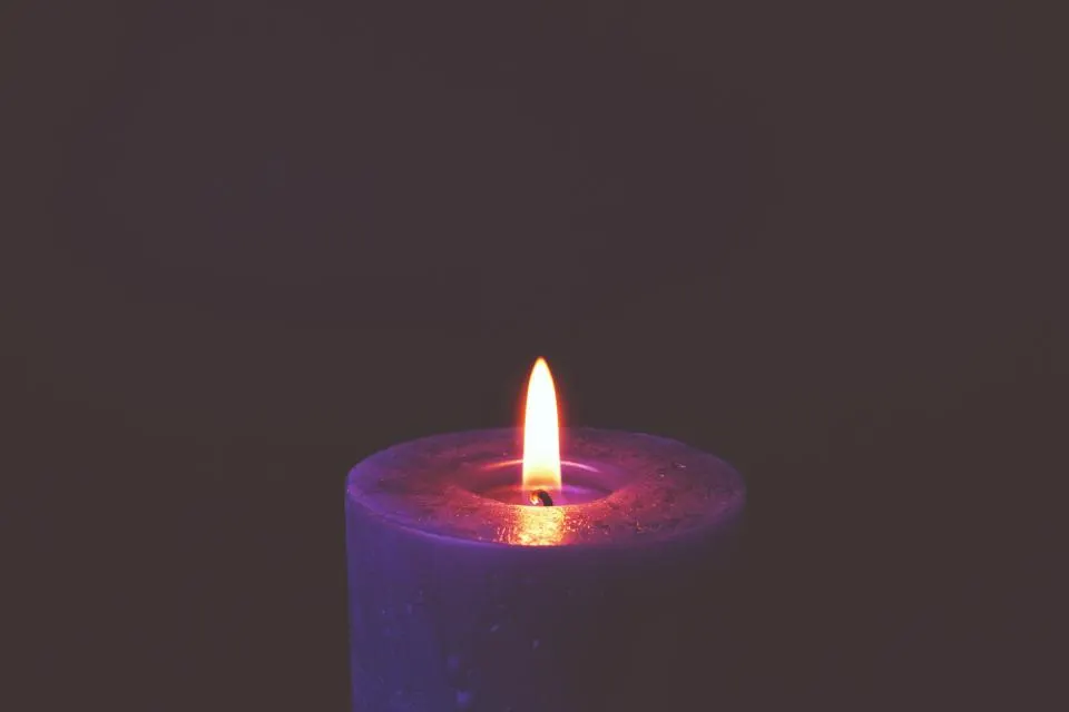 A lit candle (stock image)